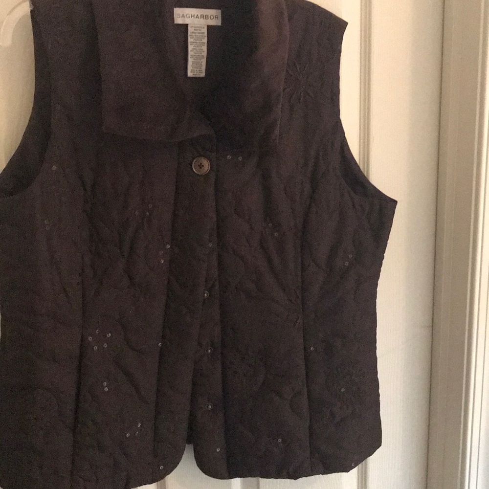 Nice vest with really cute stitching and details.